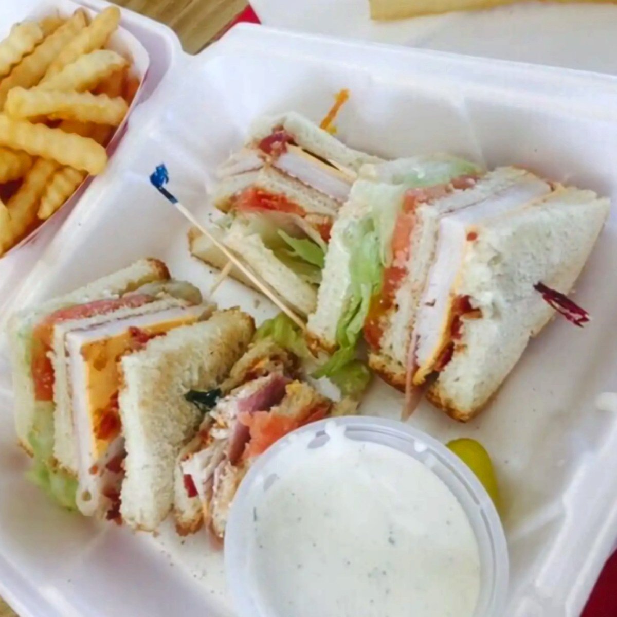 Club sandwich with crinkle fries and ranch